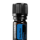 doTERRA Deep Blue essential oil bottle on a white background